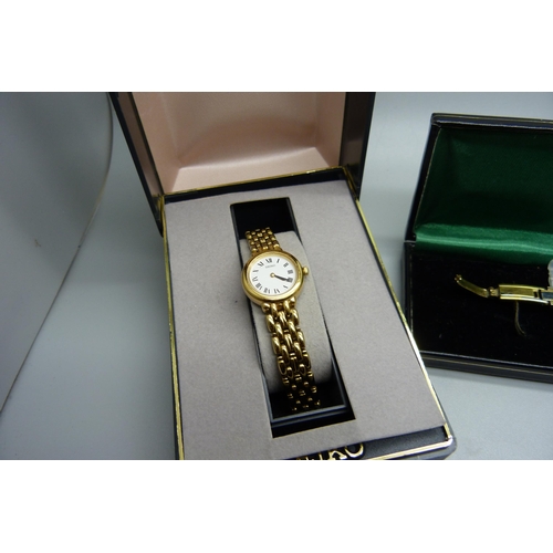 908 - Two lady's wristwatches, Rotary and Seiko, boxed, and an enamelled 3d bit on a chain