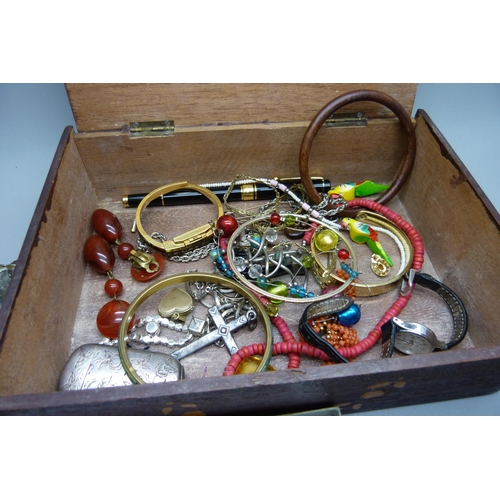 924 - A box of costume jewellery, wristwatches, brass watch case and vesta