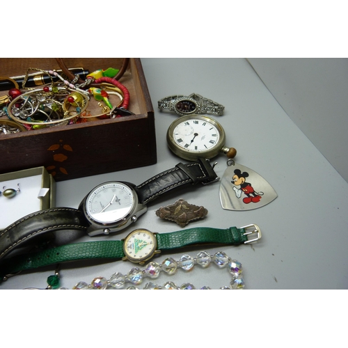 924 - A box of costume jewellery, wristwatches, brass watch case and vesta