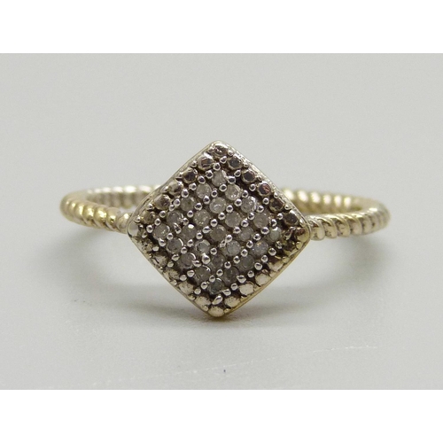 930 - A silver gilt, twenty-five stone diamond ring, N