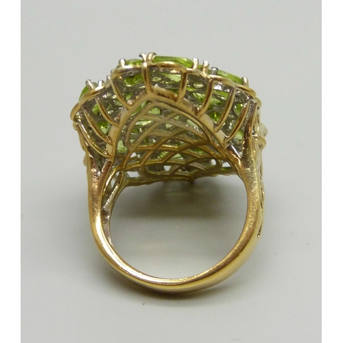 933 - A large silver gilt and peridot cocktail ring, S, 37mm x 25mm