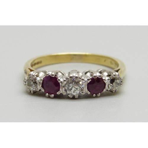 937 - An 18ct gold, ruby and diamond five stone ring, 3.8g, M, boxed