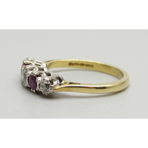 937 - An 18ct gold, ruby and diamond five stone ring, 3.8g, M, boxed