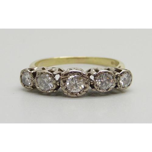 942 - An 18ct gold, five stone diamond ring, Sheffield 1979, 0.75ct diamond weight, 4g, R