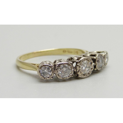 942 - An 18ct gold, five stone diamond ring, Sheffield 1979, 0.75ct diamond weight, 4g, R