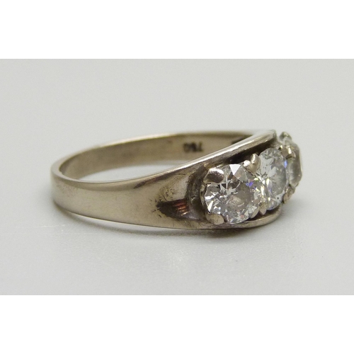 945 - An 18ct white gold diamond trilogy ring, approximately 1.35ct diamond weight, marked 750, 5.2g, N, o... 