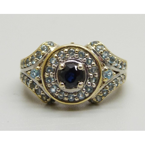 962 - A silver gilt, sapphire and topaz cluster ring, N/O