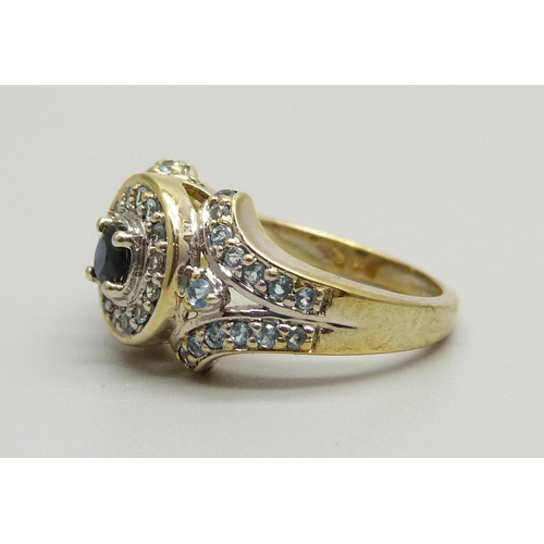 962 - A silver gilt, sapphire and topaz cluster ring, N/O