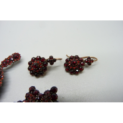 994 - Bohemian garnet set jewellery; brooch, earrings and pendant/picture locket, (pendant 38mm wide)