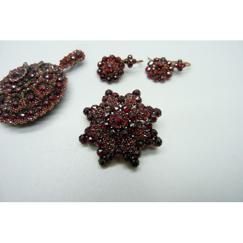 994 - Bohemian garnet set jewellery; brooch, earrings and pendant/picture locket, (pendant 38mm wide)