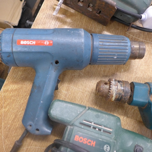 2010 - A quantity of power tools, mainly Bosch including a PSS 23 sander, PHG 1 heat gun, jigsaw, Black and... 