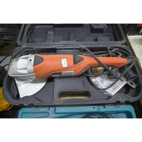 2014 - A Makita drill (model:- 8391D) with two batteries and Black and Decker angle grinder