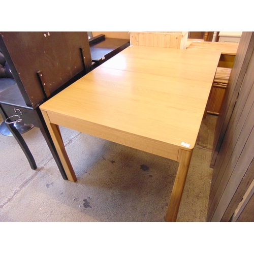 1604 - A beech bar table and two swivel stools