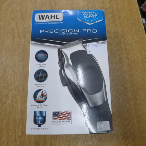 2104 - A Wahl Precision Pro hair clipper with case and multiple hair cutting attachments