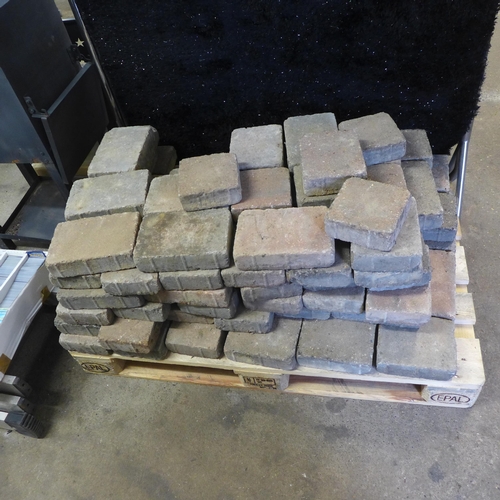 2232 - Two pallets of paving blocks including bag of sand and timber