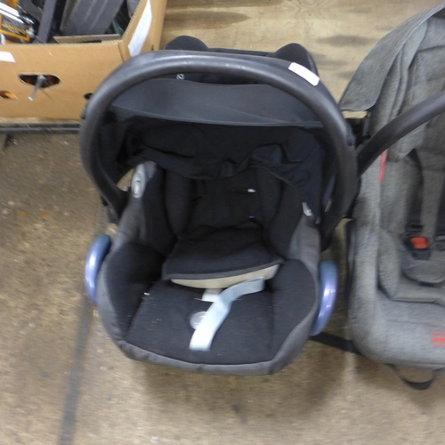 2416 - Two baby carriers/car seaters including Maxi-Cosi