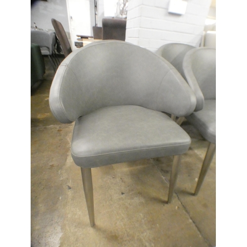 1475 - A set of four grey upholstered dining chairs  * This lot is subject to VAT