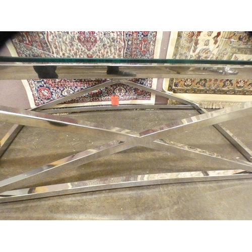 1494 - A glass and chrome coffee table * this lot is subject to VAT