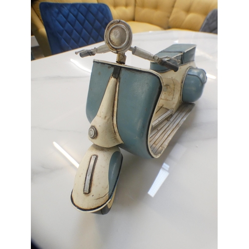 1500 - A tin plate scooter