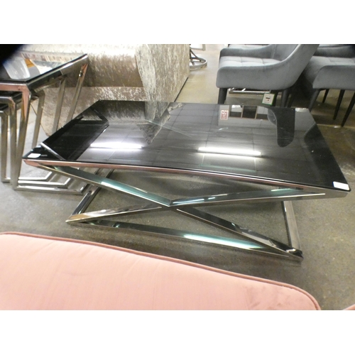 1504 - A black glass and chrome coffee table * this lot is subject to VAT