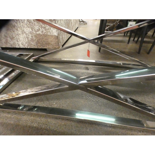 1504 - A black glass and chrome coffee table * this lot is subject to VAT