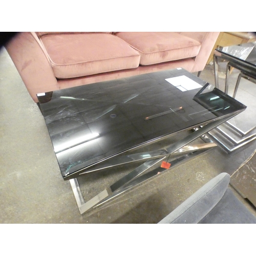 1504 - A black glass and chrome coffee table * this lot is subject to VAT