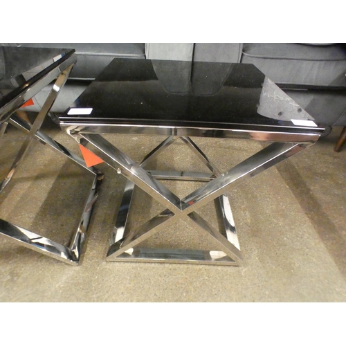 1506 - A black glass and chrome lamp table * this lot is subject to VAT