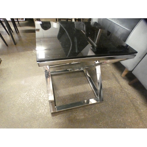 1506 - A black glass and chrome lamp table * this lot is subject to VAT