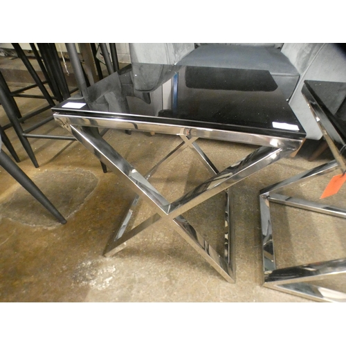 1507 - A black glass and chrome lamp table * this lot is subject to VAT