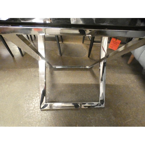 1507 - A black glass and chrome lamp table * this lot is subject to VAT