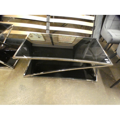 1516 - A black glass and chrome coffee table * this lot is subject to VAT