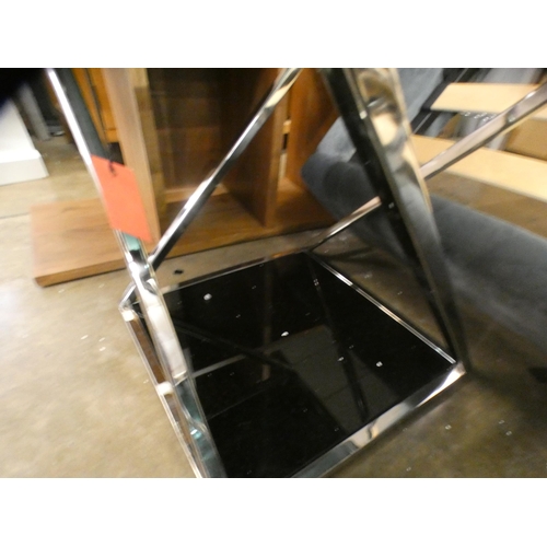 1517 - A black glass and chrome lamp table * this lot is subject to VAT