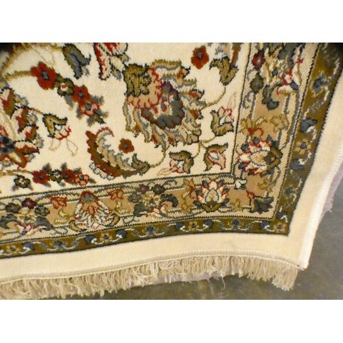 1544 - A large ivory ground full-pile cashmere carpet with all-over floral design (340cm x 240cm)