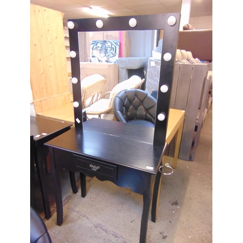 1605 - A black painted dressing table with illuminated mirror