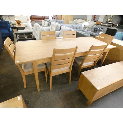 1303 - A Bonne Ash extending dining table and six chairs * this lot is subject to VAT