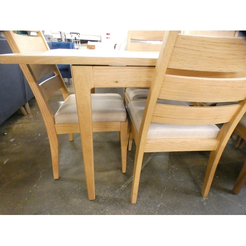 1303 - A Bonne Ash extending dining table and six chairs * this lot is subject to VAT