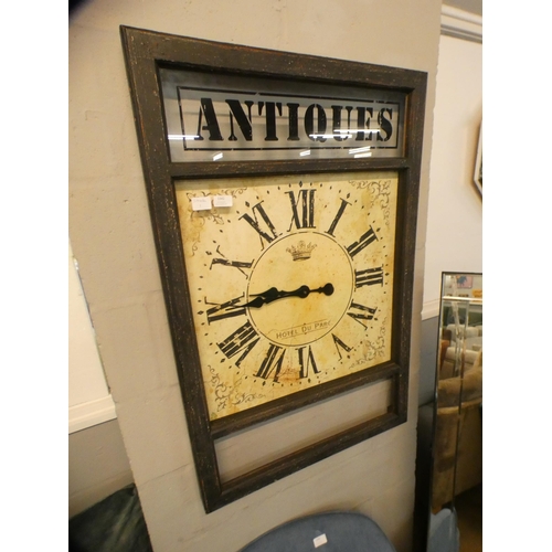 1342 - A French style 'Antiques' wall clock