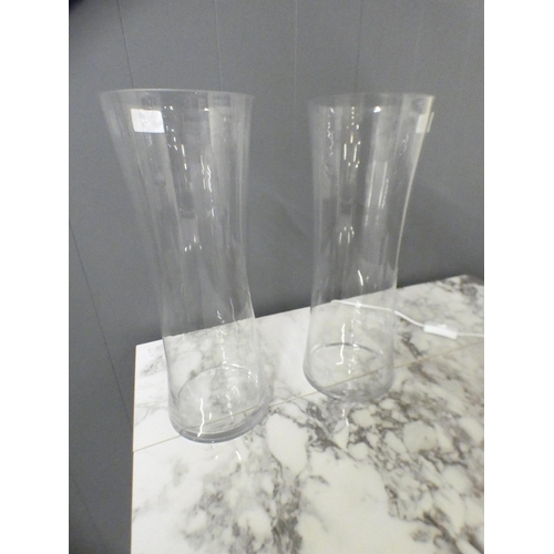 1388 - A pair of tall clear glass vases