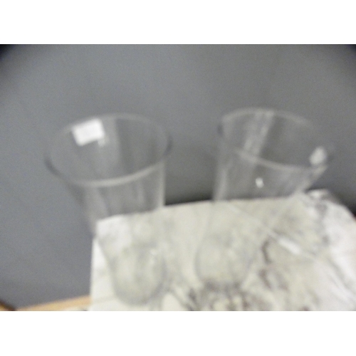 1388 - A pair of tall clear glass vases