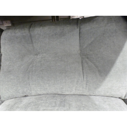 1443 - A teal upholstered three seater sofa on turned legs