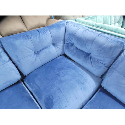 1447 - A blue velvet corner sofa