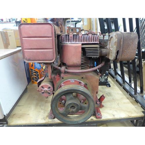 2304 - A Briggs and Stratton 10HP electric start foot mount engine