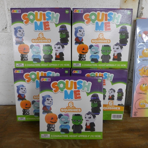 2319 - Five boxes of Halloween squish me slow rising squishes (6 per box), emoji magnets and Alice in wonde... 