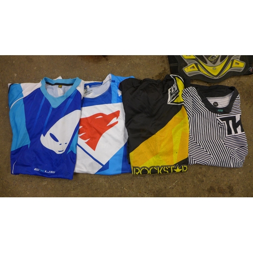 2335 - A box of motor cross clothing including-
Wulfsport Helmet S 550-560
UFO Spectra Helmet Gr 1400 +50 L... 