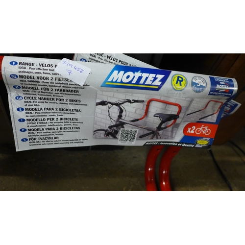 2383 - Two Motez double bicycle wall carriers/mounts - unused