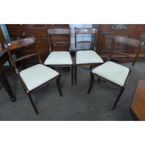 104 - A set of four Regency style mahogany dining chairs