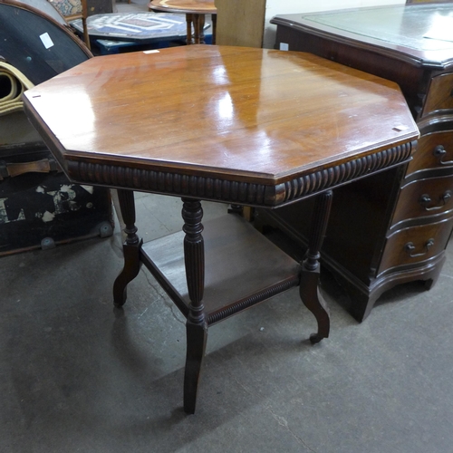 108 - A Victorian Gillows style walnut octagonal centre table