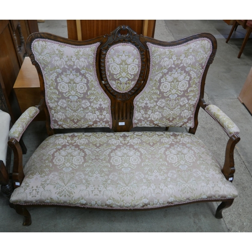 118 - An Edward VII mahogany and fabric upholstered salon settee