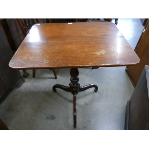 124 - A George IV mahogany rectangular tilt-top tripod tea table