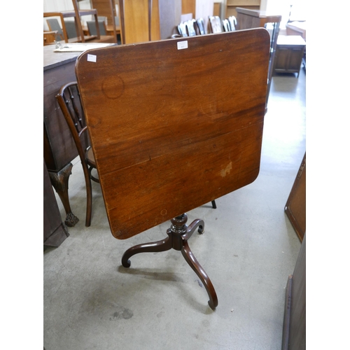 124 - A George IV mahogany rectangular tilt-top tripod tea table